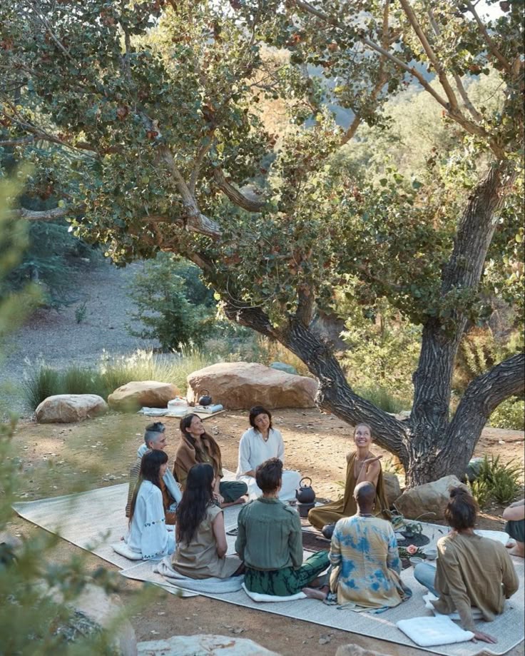 A circle of people sitting together in conversation